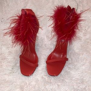 Red heels with fur boa